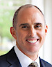 SYFS CEO: Chris W. Roussos